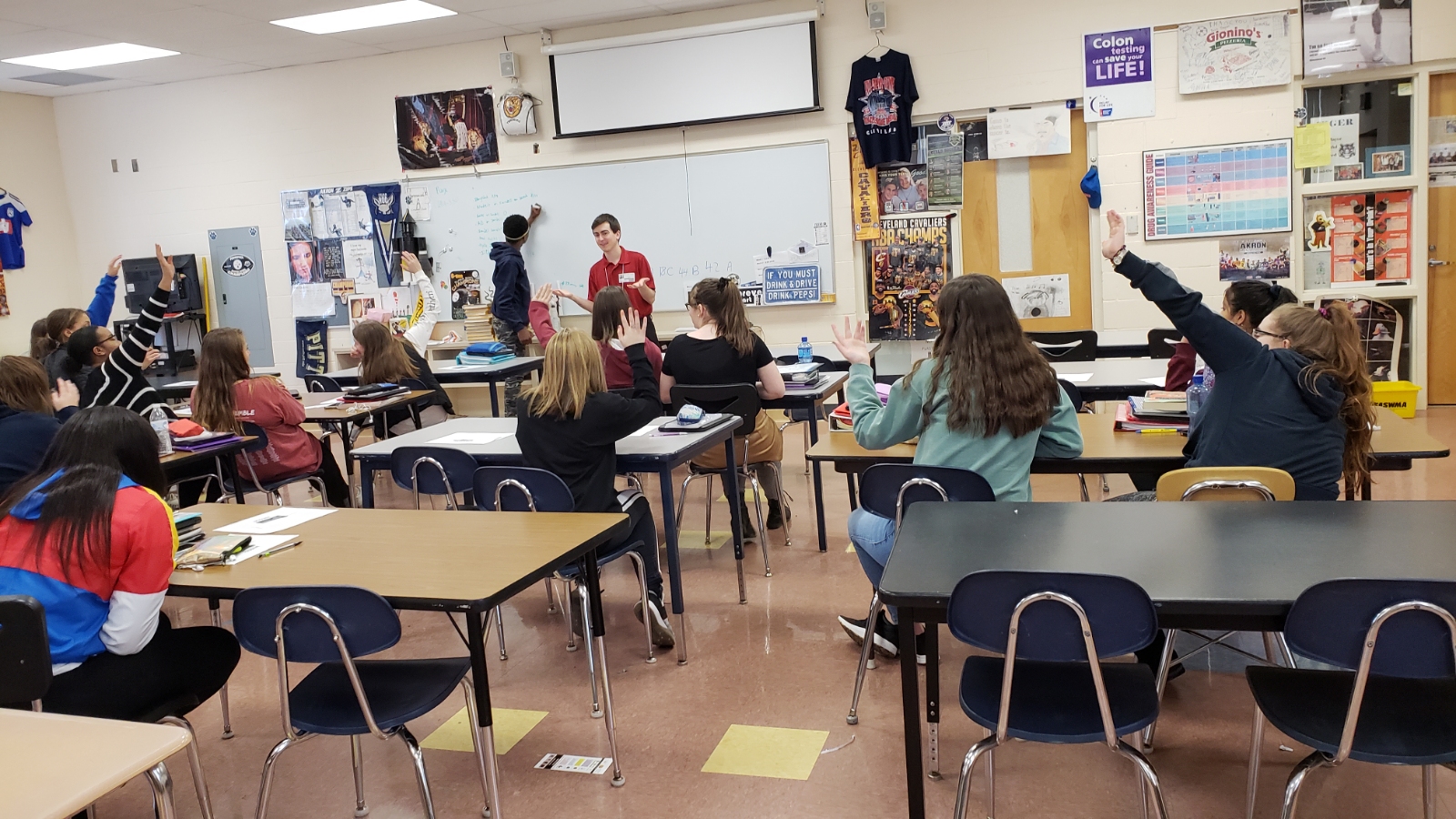 Candidate for State Representative, Nathan Jarosz, teaches leadership skills in a classroom.